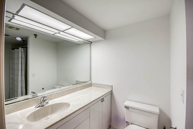 123 Lakeshore Dr Unit 1644, North Palm Beach, FL 33408 - bathroom with toilet and vanity