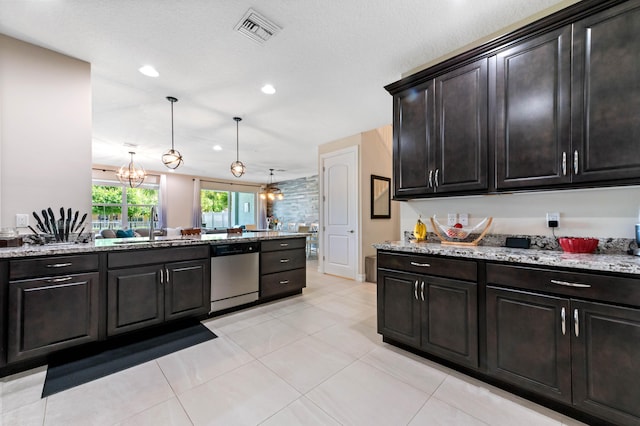kitchen with stainless steel dishwasher, a sink, light stone counters, decorative light fixtures, and recessed lighting