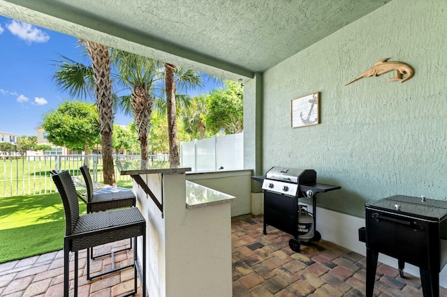 view of patio featuring area for grilling and an outdoor kitchen