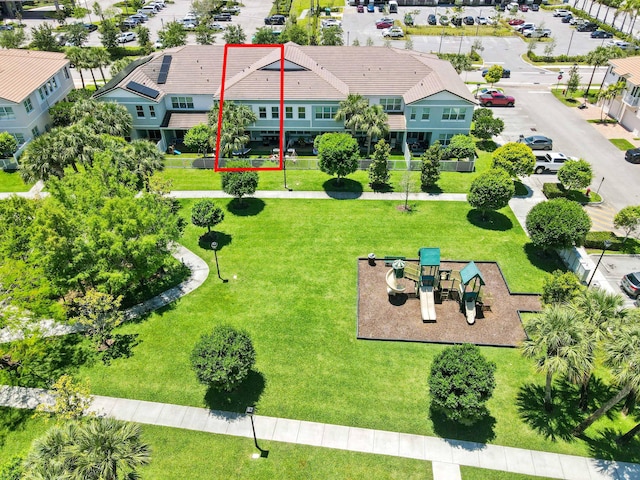 aerial overview of property's location with property parcel outlined and a park
