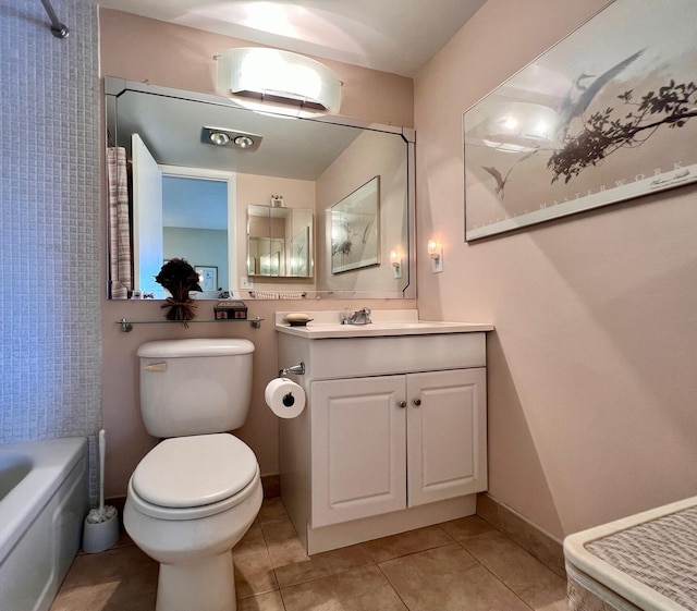 full bathroom with toilet, tile patterned flooring, and vanity