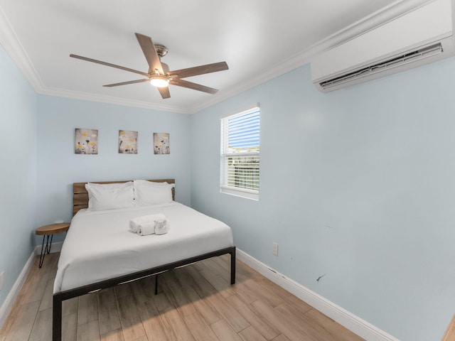 629 N F St, Lake Worth Beach, FL 33460 - bedroom featuring a wall unit AC, crown molding, baseboards, light wood-type flooring, and a ceiling fan