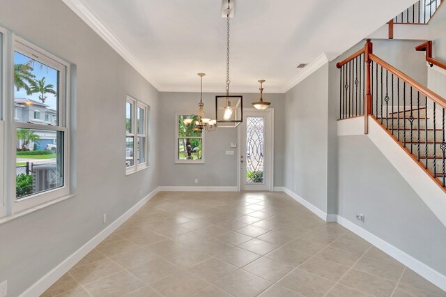 40 Country Lake Cir, Boynton Beach, FL 33436 - unfurnished dining area with a chandelier, light tile patterned flooring, crown molding, baseboards, and stairway
