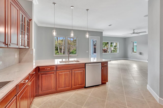 40 Country Lake Cir, Boynton Beach, FL 33436 - kitchen featuring dishwasher, a sink, backsplash, a peninsula, and crown molding