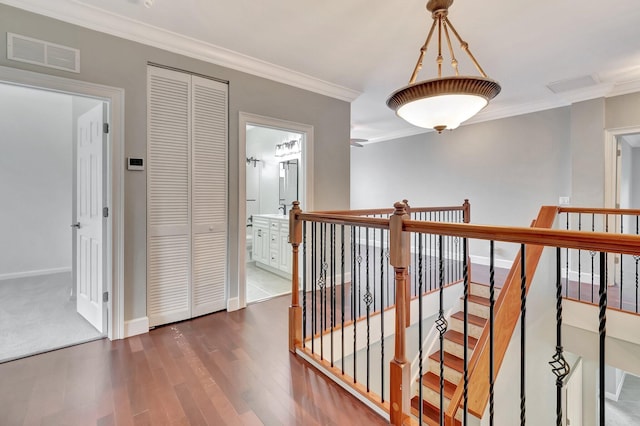 40 Country Lake Cir, Boynton Beach, FL 33436 - corridor with an upstairs landing, wood finished floors, crown molding, and baseboards