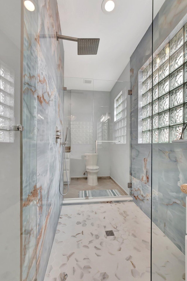 40 Country Lake Cir, Boynton Beach, FL 33436 - bathroom with a marble finish shower and toilet