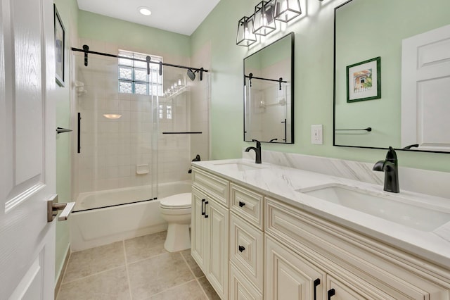 40 Country Lake Cir, Boynton Beach, FL 33436 - bathroom with toilet, double vanity, combined bath / shower with glass door, and tile patterned flooring