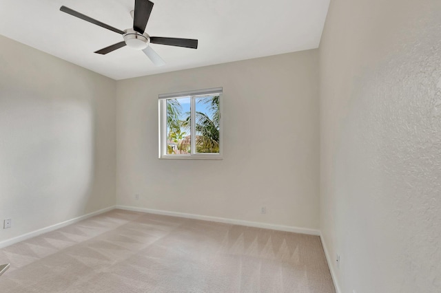 40 Country Lake Cir, Boynton Beach, FL 33436 - unfurnished room featuring light colored carpet, baseboards, and ceiling fan