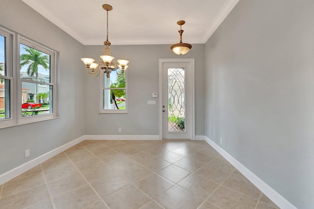 40 Country Lake Cir, Boynton Beach, FL 33436 - entryway featuring plenty of natural light, light tile patterned floors, a chandelier, ornamental molding, and baseboards
