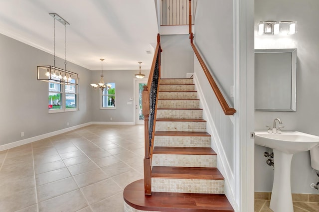 40 Country Lake Cir, Boynton Beach, FL 33436 - stairs featuring crown molding, tile patterned floors, a chandelier, and baseboards