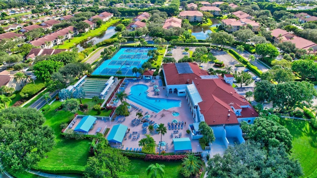 aerial perspective of suburban area with a pool area