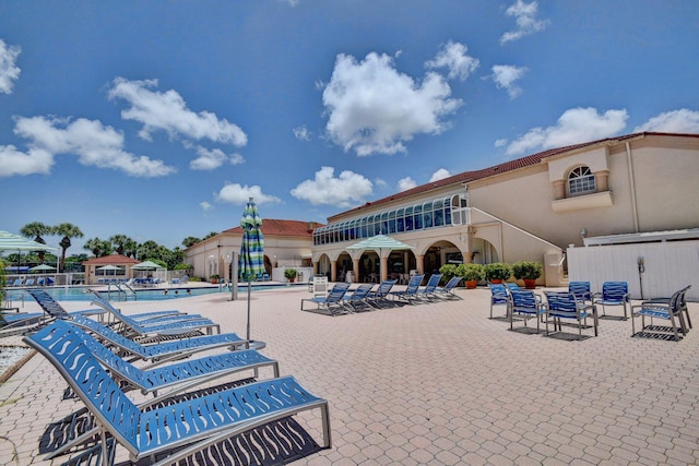 community pool with a patio