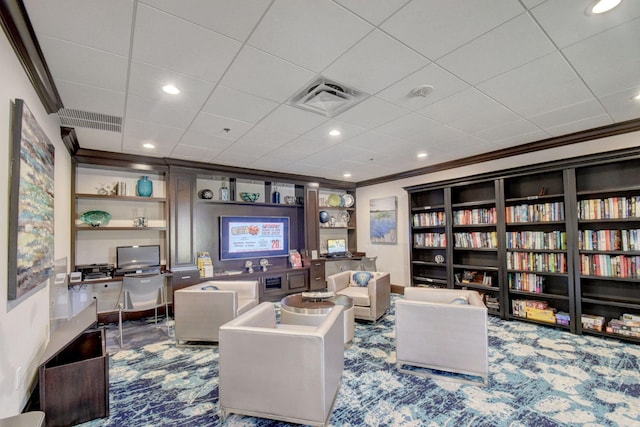 carpeted living room with crown molding and built in features