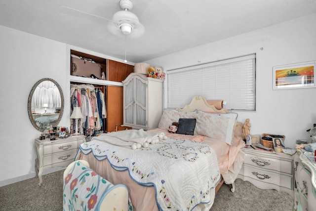 730 NE 23rd Pl, Pompano Beach, FL 33064 - carpeted bedroom featuring a closet and ceiling fan