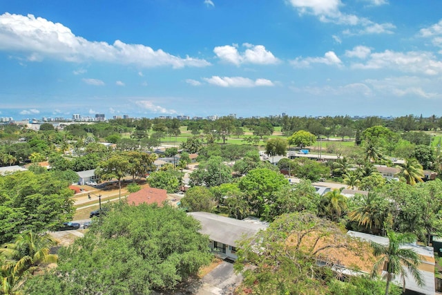 730 NE 23rd Pl, Pompano Beach, FL 33064 - aerial view of property and surrounding area featuring a tree filled landscape