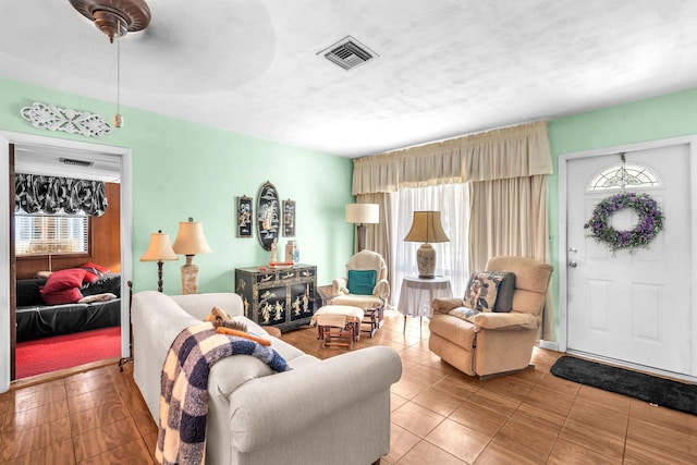 730 NE 23rd Pl, Pompano Beach, FL 33064 - tiled living room with healthy amount of natural light