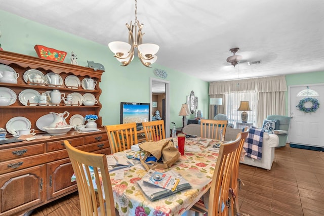 730 NE 23rd Pl, Pompano Beach, FL 33064 - dining room with a chandelier