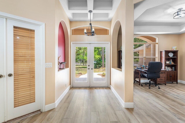 16737 Temple Blvd, Loxahatchee, FL 33470 - entryway featuring french doors, baseboards, healthy amount of natural light, an office area, and coffered ceiling