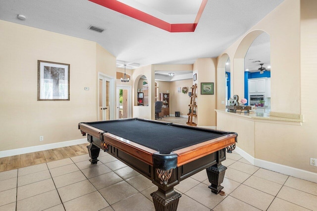 16737 Temple Blvd, Loxahatchee, FL 33470 - recreation room with arched walkways, light tile patterned floors, baseboards, and billiards table