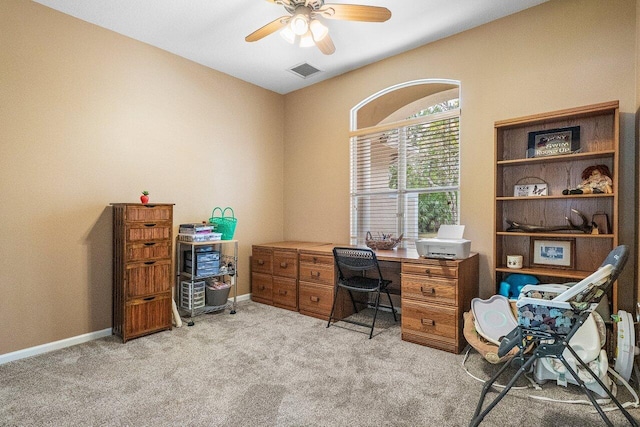16737 Temple Blvd, Loxahatchee, FL 33470 - home office with light carpet, a ceiling fan, and baseboards