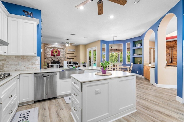 16737 Temple Blvd, Loxahatchee, FL 33470 - kitchen featuring stainless steel appliances, ceiling fan, a sink, a kitchen island, and recessed lighting