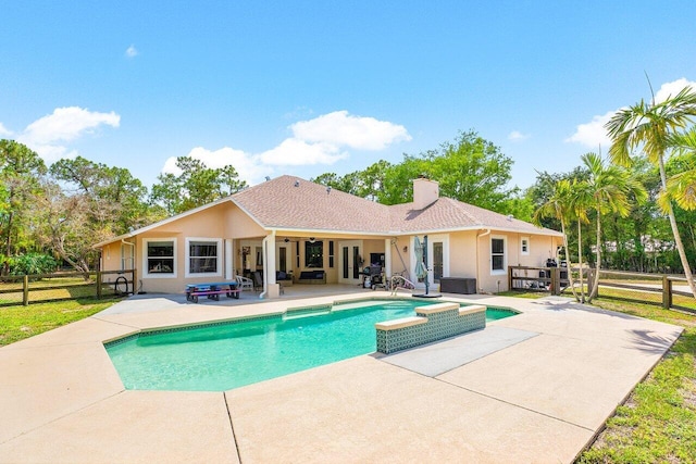 16737 Temple Blvd, Loxahatchee, FL 33470 - outdoor pool with a patio, fence, and ceiling fan