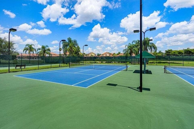 22075 Flower Dr, Boca Raton, FL 33428 - view of tennis court featuring fence and community basketball court