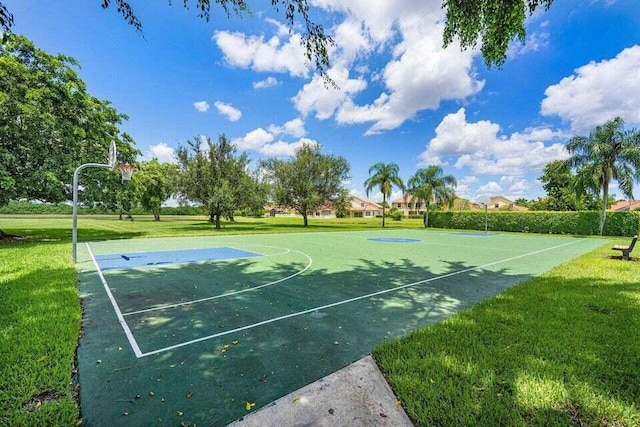 22075 Flower Dr, Boca Raton, FL 33428 - view of sport court with a lawn and community basketball court