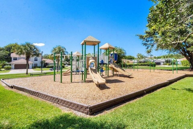 22075 Flower Dr, Boca Raton, FL 33428 - communal playground featuring a lawn