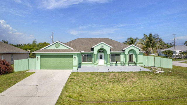 1985 SW Beard St, Port Saint Lucie, FL 34953 - ranch-style house featuring a garage, driveway, stucco siding, and roof with shingles