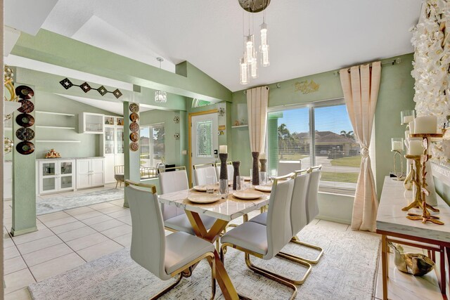 1985 SW Beard St, Port Saint Lucie, FL 34953 - dining space featuring lofted ceiling and light tile patterned flooring