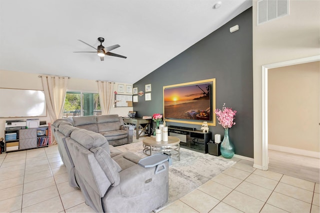 1985 SW Beard St, Port Saint Lucie, FL 34953 - living area with a ceiling fan, tile patterned flooring, high vaulted ceiling, and baseboards