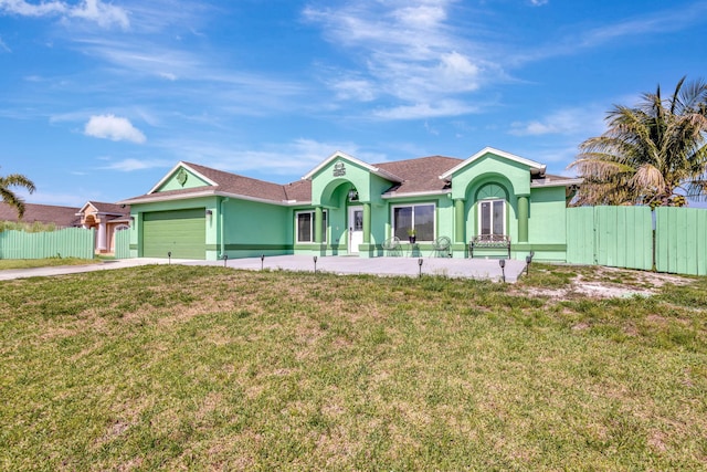 1985 SW Beard St, Port Saint Lucie, FL 34953 - ranch-style house with an attached garage, stucco siding, and driveway