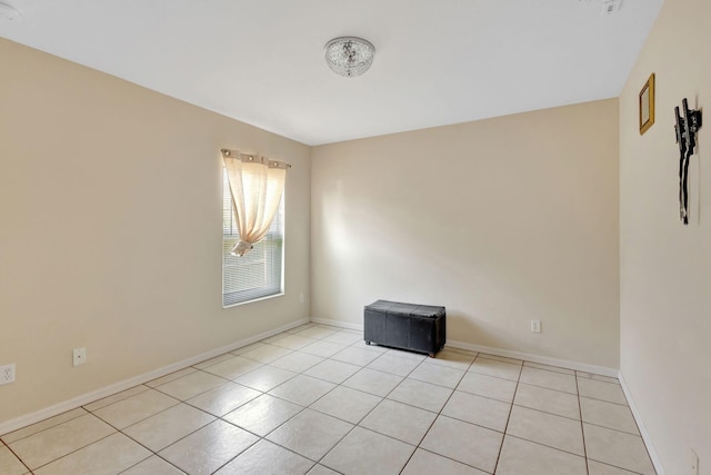 1985 SW Beard St, Port Saint Lucie, FL 34953 - empty room featuring light tile patterned floors and baseboards