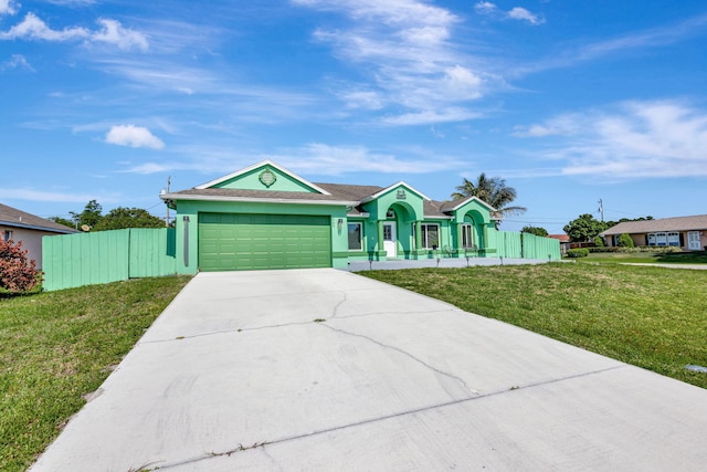 1985 SW Beard St, Port Saint Lucie, FL 34953 - ranch-style home featuring an attached garage, driveway, and stucco siding