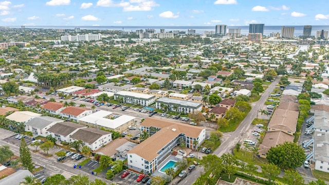 view of urban area featuring a nearby body of water