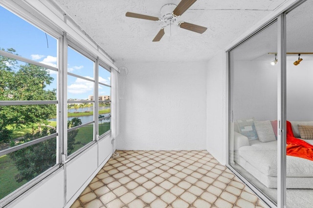 14623 Bonaire Blvd Unit 405, Delray Beach, FL 33446 - unfurnished sunroom featuring a water view