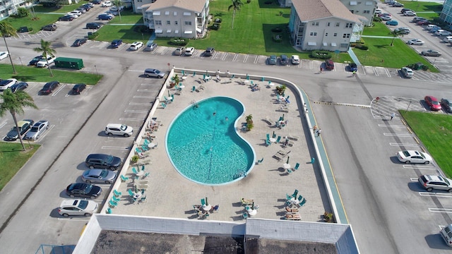 drone / aerial view of a pool