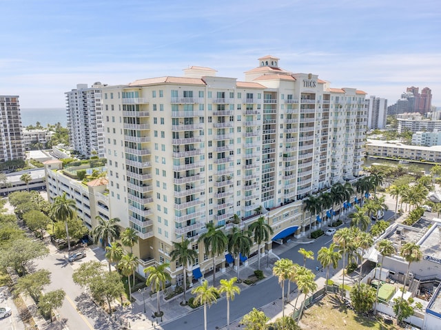 view of apartment building / complex with a city view