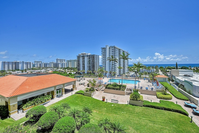view of urban area featuring a pool area