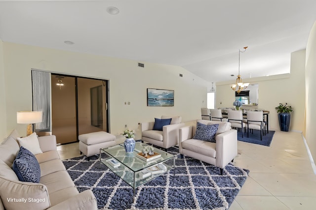 6120 Kings Gate Cir, Delray Beach, FL 33484 - living room featuring a chandelier, lofted ceiling, and light tile patterned flooring
