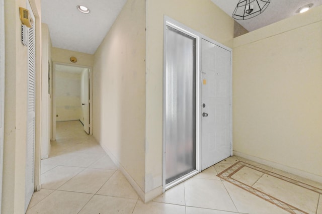 6120 Kings Gate Cir, Delray Beach, FL 33484 - hallway with light tile patterned floors, baseboards, and recessed lighting