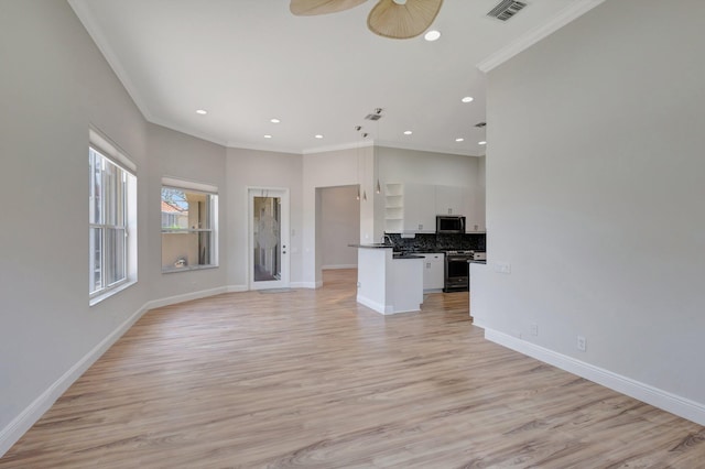 unfurnished living room with ornamental molding, baseboards, light wood-type flooring, recessed lighting, and ceiling fan