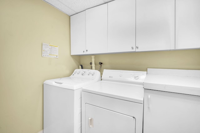 2230 NE 62nd St, Fort Lauderdale, FL 33308 - clothes washing area featuring cabinet space and washing machine and clothes dryer