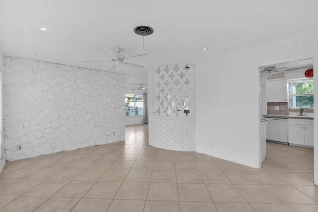 2230 NE 62nd St, Fort Lauderdale, FL 33308 - unfurnished living room featuring ceiling fan, light tile patterned floors, recessed lighting, a sink, and crown molding