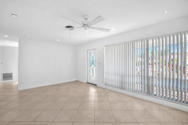 2230 NE 62nd St, Fort Lauderdale, FL 33308 - spare room featuring ceiling fan, recessed lighting, light tile patterned floors, and baseboards