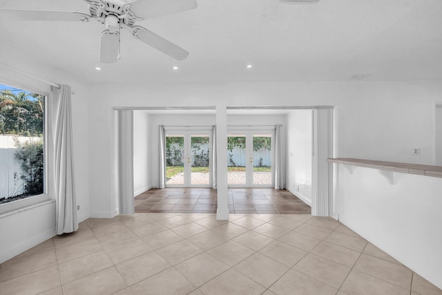 2230 NE 62nd St, Fort Lauderdale, FL 33308 - spare room with french doors, plenty of natural light, a ceiling fan, light tile patterned floors, and recessed lighting