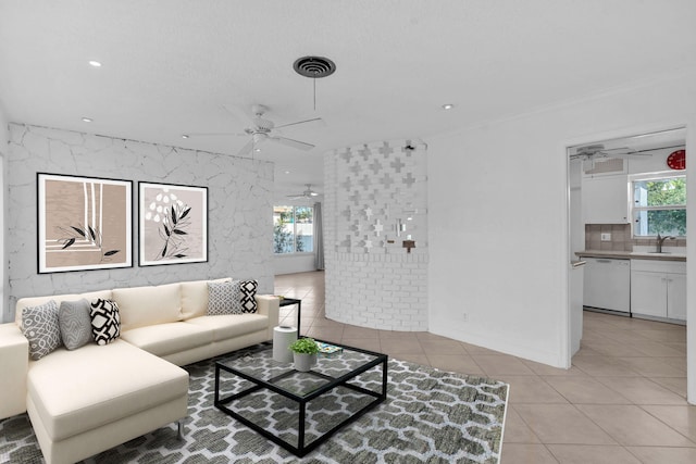 2230 NE 62nd St, Fort Lauderdale, FL 33308 - living area with a ceiling fan, light tile patterned floors, recessed lighting, and crown molding