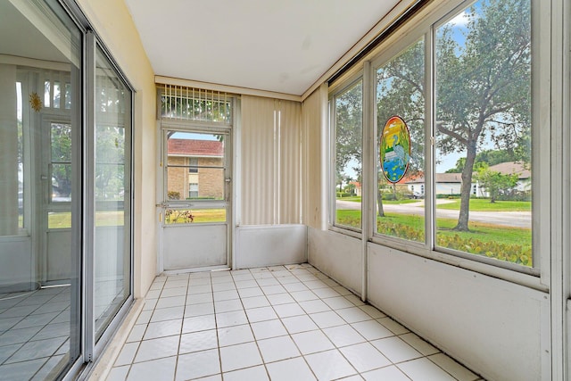 unfurnished sunroom with plenty of natural light