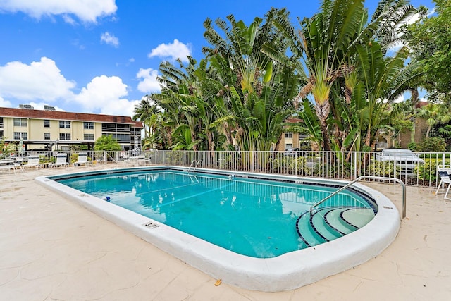 community pool with fence